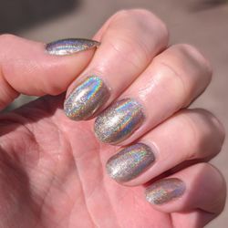 Nexus Nails and Spa - Cat Eye Grey with holographic chrome powder.