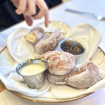 Scala Osteria - Zeppole Dessert - classic Italian doughnuts, chocolate sauce and crème anglaise - Italian Near Me - Napa, California Scala Osteria - Zeppole Dessert - classic Italian doughnuts, chocolate sauce and crème anglaise - Italian Near Me - Napa, California