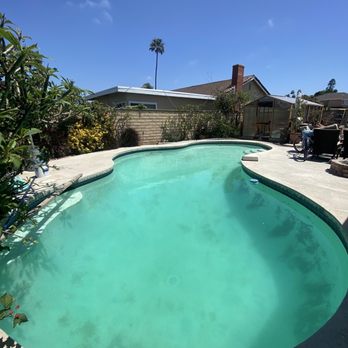 Beachfront Pool Service - After Paul worked his magic.   ***plaster is 40+ years old ignore the black - Pool Cleaners Near Me