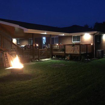 Dailey Construction - a backyard with a fire pit - Flooring Near Me - Wintersville, Ohio Dailey Construction - a backyard with a fire pit - Flooring Near Me - Wintersville, Ohio