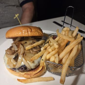 Whiskey Kitchen - Swiss mushroom burger with French fries. - American Near Me - Slidell, Louisiana Whiskey Kitchen - Swiss mushroom burger with French fries. - American Near Me - Slidell, Louisiana