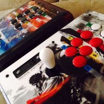 World 8 - MadCatz TE sticks dual-modded for PS3/X360 with 8-way bat-tops and Sanwa buttons courtesy of World 8 - Videos & Video Game Rental Near Me - Los Angeles, California World 8 - MadCatz TE sticks dual-modded for PS3/X360 with 8-way bat-tops and Sanwa buttons courtesy of World 8 - Videos & Video Game Rental Near Me - Los Angeles, California