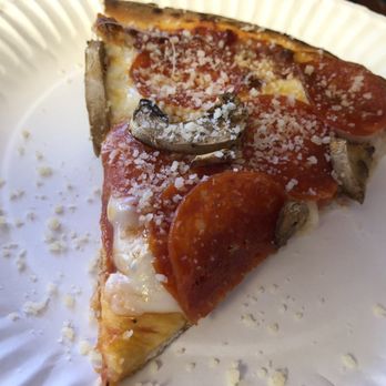 Pizza Zazza - a slice of pizza on a paper plate - Pizza Near Me - Las Vegas, Nevada Pizza Zazza - a slice of pizza on a paper plate - Pizza Near Me - Las Vegas, Nevada