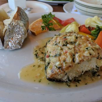 Splash Baja - Seabass in garlic sauce - Mexican Near Me - Primo Tapia, BCN Splash Baja - Seabass in garlic sauce - Mexican Near Me - Primo Tapia, BCN