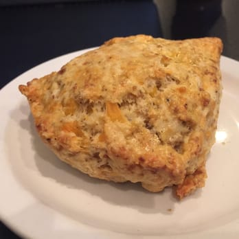 Radina's Coffeehouse & Roastery - Savory sausage cheddar scone, which came highly recommended from both girls at the counter. - Bakeries Near Me - Manhattan, Kansas Radina's Coffeehouse & Roastery - Savory sausage cheddar scone, which came highly recommended from both girls at the counter. - Bakeries Near Me - Manhattan, Kansas