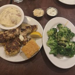 2 appetizers and 2 sides.  Mediterranean chicken skewers, oven roasted lump crab cakes, fresh broccoli and redskin mashed potatoes.