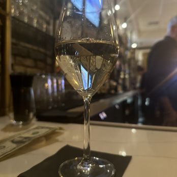 Two25 - a glass of water on a table - Italian Near Me - Locust Valley, New York
