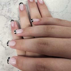 Viva Nail Lounge - My daughter loves her cow print nails! Helen did such a great job for her.