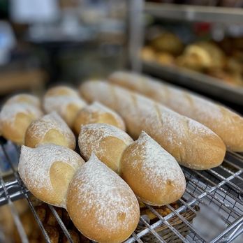 The Flying Apron - a bunch of bread rolls on a cooling rack - Bakeries Near Me - Comox, British Columbia The Flying Apron - a bunch of bread rolls on a cooling rack - Bakeries Near Me - Comox, British Columbia