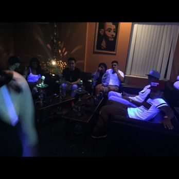 Ramsey's Hookah Lounge - a group of people in a living room - Hookah Bars Near Me - Buffalo, New York