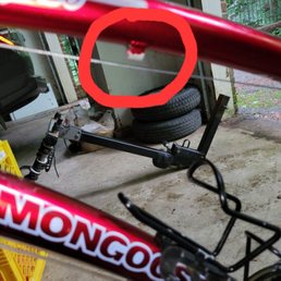 Brake cable not threaded through eyelet on frame. Snags bike racks, catches clothing and not properly tensioned.