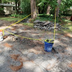 All-phase Paving and Sealing - Deep holes and roots This hole prevented me from accessing the rear of my house.