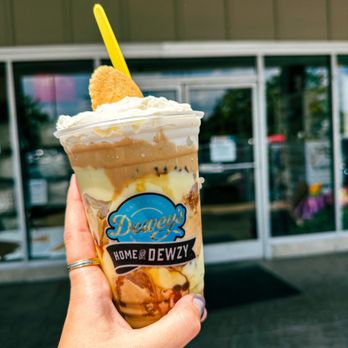 Dewey's Bakery - a hand holding a cup of ice cream - Bakeries Near Me - Winston Salem, North Carolina Dewey's Bakery - a hand holding a cup of ice cream - Bakeries Near Me - Winston Salem, North Carolina