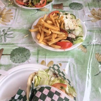 Amino's - two plates of food on a table - Greek Near Me - Oromocto, New Brunswick
