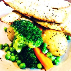 Crowded House Bar & Cafe - Fish of the day, young potatoes and sweet peas.