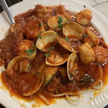 Bella Capri Restaurant & Grill - a plate of pasta with clams - Italian Near Me - Georgetown, Delaware Bella Capri Restaurant & Grill - a plate of pasta with clams - Italian Near Me - Georgetown, Delaware