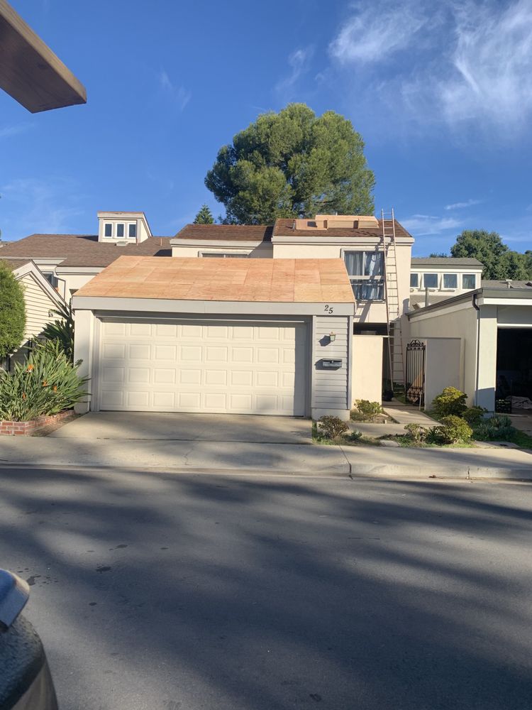 Slide of Baiza's Roofing