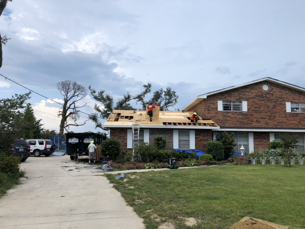 Slide of Old Town Roofing