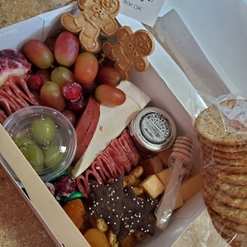 Happy Grazing - Under the lid... three cheeses, two meats, fresh and dried fruits, honey,  seasond almonds,  olives and more! - Caterers Near Me