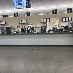 Department of Motor Vehicles - Lots of empty desks/windows with no employees