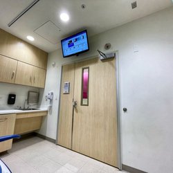 Our Lady of the Lake Children's Hospital - Wall-mounted television over the door of every room.