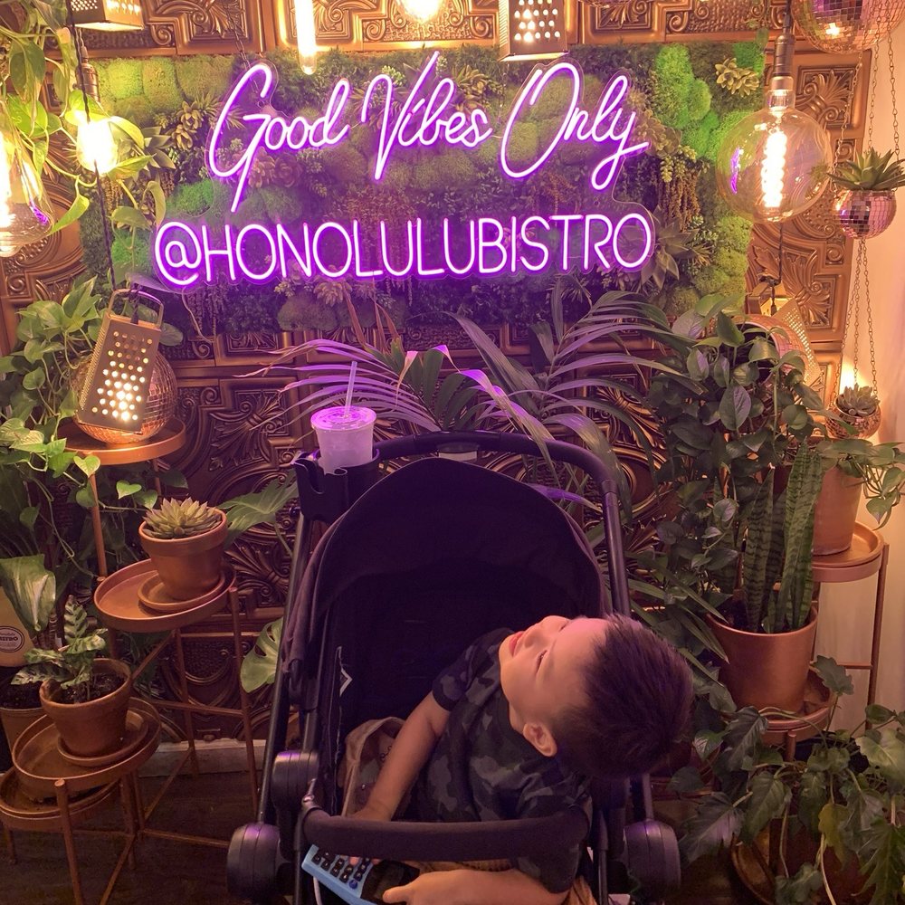 Honolulu Bistro - Son son enjoying the decor - Hawaiian Near Me - Honolulu, Hawaii