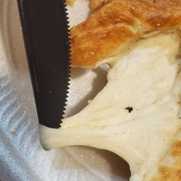 Not cheese. This is undercooked dough. Not cheese. This is undercooked dough.