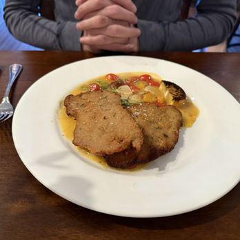 tavola - cotoletta di maiale alla milanese: breaded 'double h farm' pork, baby arugula, capers, fresh tomatoes, grilled meyer lemon - Italian Near Me - Charlottesville, Virginia tavola - cotoletta di maiale alla milanese: breaded 'double h farm' pork, baby arugula, capers, fresh tomatoes, grilled meyer lemon - Italian Near Me - Charlottesville, Virginia