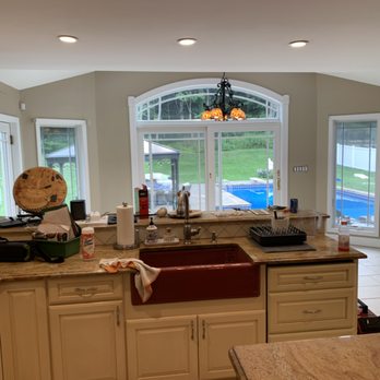 Hp Maintenance & Construction - a kitchen with a sink and a window - General Contractors Near Me - Huntington Station, New York Hp Maintenance & Construction - a kitchen with a sink and a window - General Contractors Near Me - Huntington Station, New York