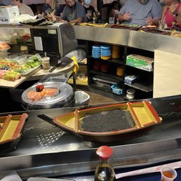 A sea of empty sushi boats. A sea of empty sushi boats.