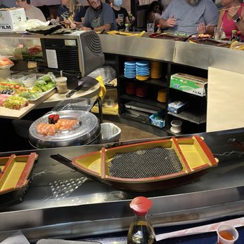 Blue Ginger - A sea of empty sushi boats. - Japanese Near Me - Southwest Ranches, Florida
