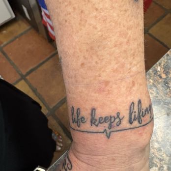 Az Tattoo Asylum - Life keeps lifing and it doesn't care about us does it? Again, this has great meaning to me - Tattoo Near Me - Phoenix , Arizona