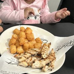 Output Sports Bar - Kids grilled chicken fingers w/ tots meal