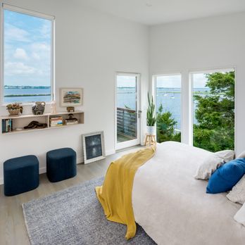 Red House Design Build - A new primary bedroom overlooking the water in Warwick, RI - General Contractors Near Me - Providence, Rhode Island