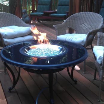Puget Sound Gas - This image shows an outside fire pit with glass pebbles in place of fire logs, there are a variety of options and colors for ... - Fireplace Services Near Me - Sultan, Washington Puget Sound Gas - This image shows an outside fire pit with glass pebbles in place of fire logs, there are a variety of options and colors for ... - Fireplace Services Near Me - Sultan, Washington