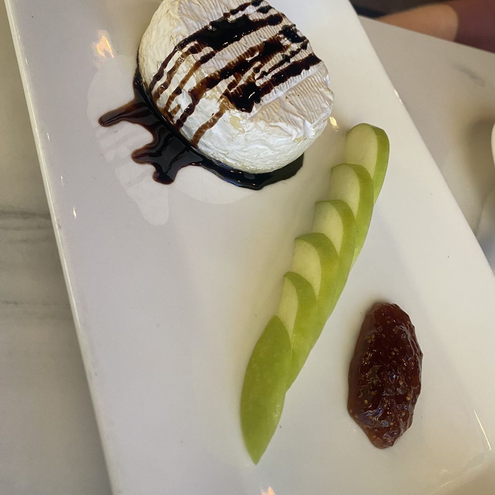 Savour Restaurant - Brie with apple and fig jam. - Modern European Near Me - Fort Myers, Florida Savour Restaurant - Brie with apple and fig jam. - Modern European Near Me - Fort Myers, Florida