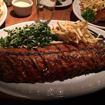 Houston's Restaurant - BBQ Ribs with kale salad and fries. - New American Near Me - Irvine, California Houston's Restaurant - BBQ Ribs with kale salad and fries. - New American Near Me - Irvine, California