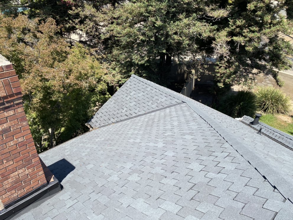 Slide of Modern Roofers and Restoration