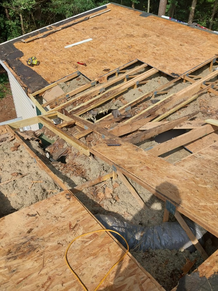 Slide of Tyndal Roofing