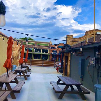 Tender Smokehouse - an outdoor patio with tables and umbrellas - Barbeque Near Me - Celina, Texas Tender Smokehouse - an outdoor patio with tables and umbrellas - Barbeque Near Me - Celina, Texas