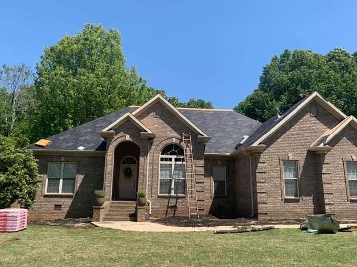 Slide of Tycon Roofing