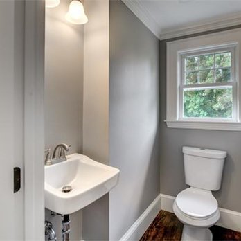 Split Rock Construction - a bathroom with a toilet and sink - General Contractors Near Me - Needham, Massachusetts