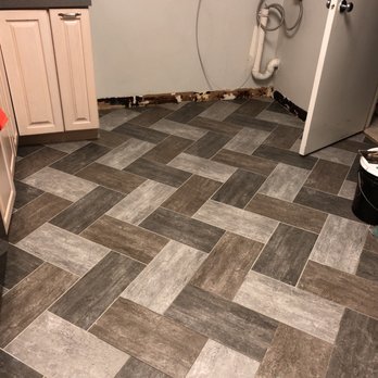 B & B Floor Co. - a bathroom with a sink and toilet - Carpeting Near Me - Springfield, Virginia