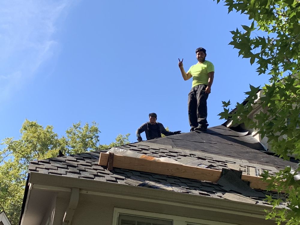 Slide of Signature Roofing