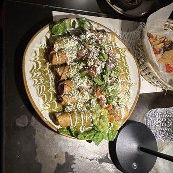 Maderas - Kitchen & Cantina - Flautas with green sauce - New Mexican Cuisine Near Me - Houston, Texas Maderas - Kitchen & Cantina - Flautas with green sauce - New Mexican Cuisine Near Me - Houston, Texas