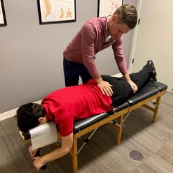 Atlanta Spine and Wellness - Dr. Heitman Adjusting a Patient