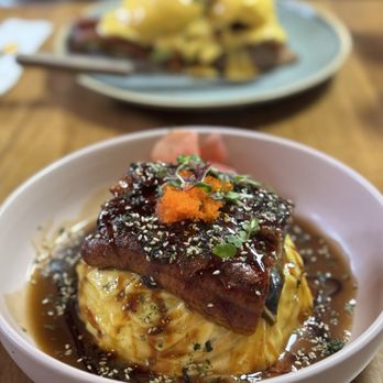 Sunny Side Breakfast - Unagi Tornado Omurice with Wealthy Pig Benedict in the background. - Breakfast & Brunch Near Me - Sacramento, California Sunny Side Breakfast - Unagi Tornado Omurice with Wealthy Pig Benedict in the background. - Breakfast & Brunch Near Me - Sacramento, California