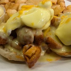 Stacked Pancake and Breakfast House - Hot hunny eggs Benedict
