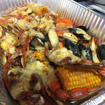 Kraby Crab - We got #11 - 6 Blue Crabs, 12 Shrimps, 6 Sausages, 12 Mussels, 3 Corn and 8 Potatoes. Really good!!! - Seafood Near Me - Tampa, Florida Kraby Crab - We got #11 - 6 Blue Crabs, 12 Shrimps, 6 Sausages, 12 Mussels, 3 Corn and 8 Potatoes. Really good!!! - Seafood Near Me - Tampa, Florida