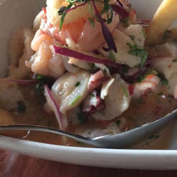Aji Peruvian Cuisine - Ceviche mercado-- shrimp, octopus, scallops, and the most delicious spicy like sauce - Peruvian Near Me - Long Beach, California